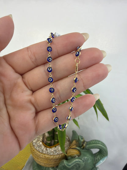 14k Turkish eye bracelet and Santa muerte 10k charm
